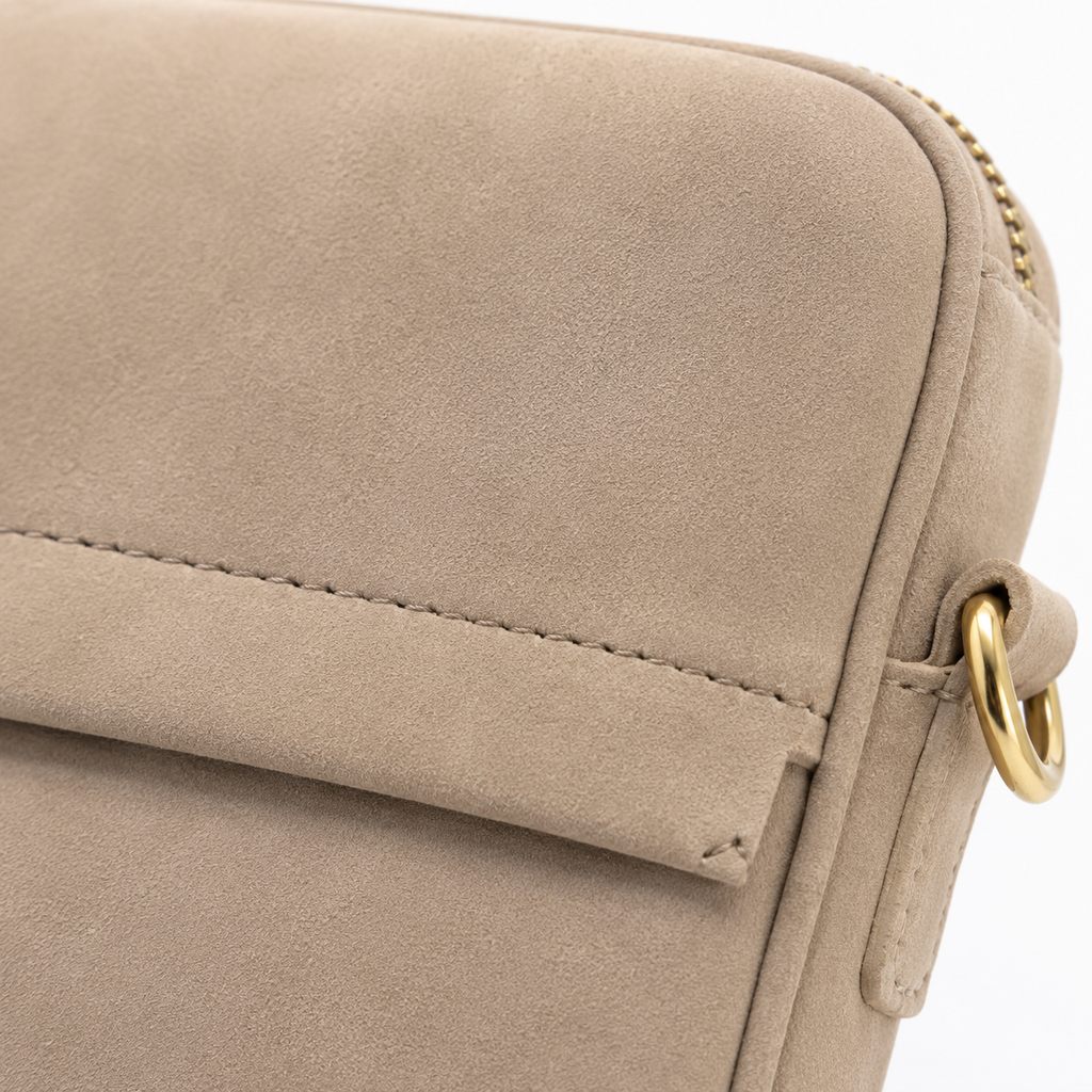 Laptop sleeve displayed with open zipper.