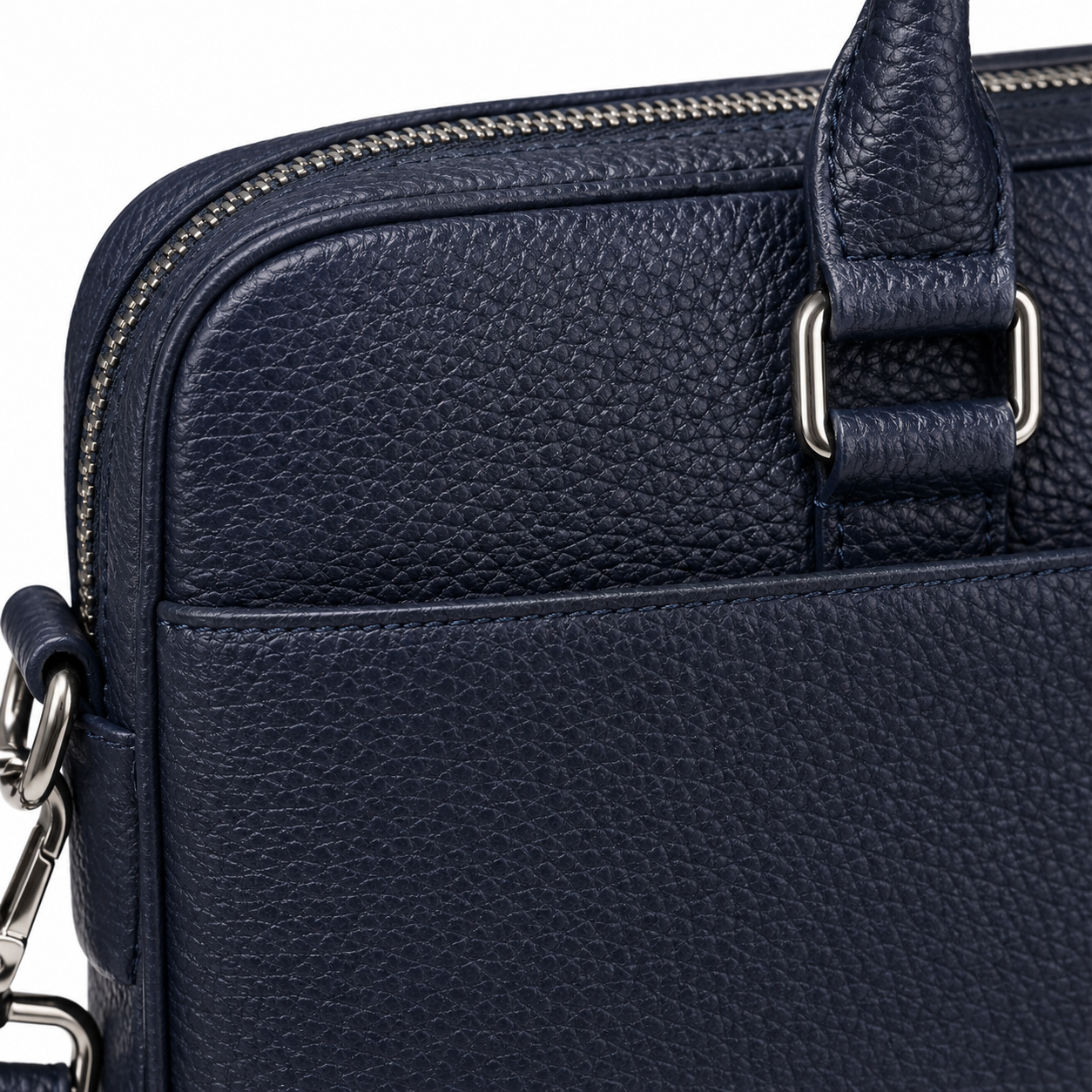 Back view of navy leather briefcase with tag.