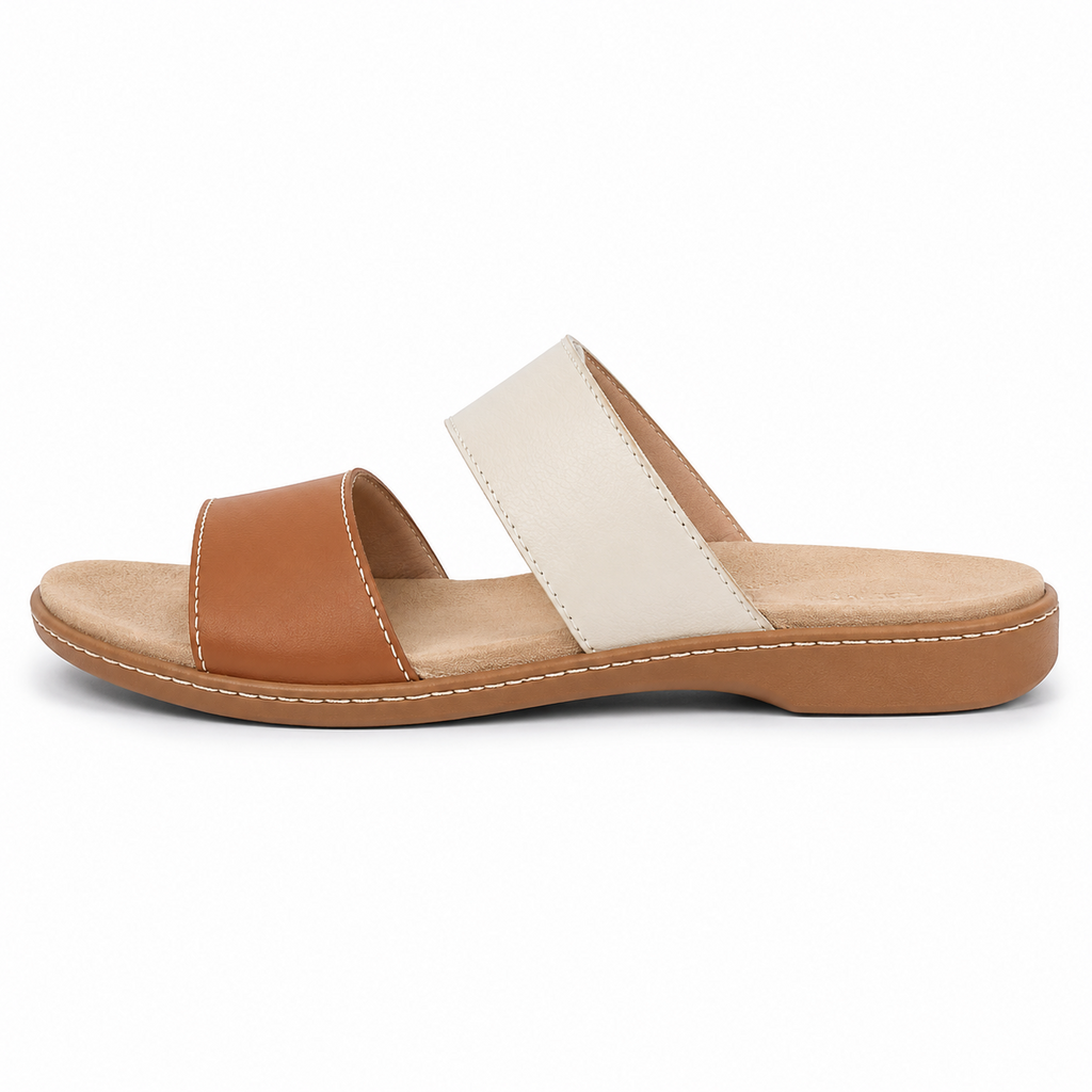 Side view of boneroshop leather slide sandal in tan and cream