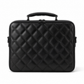 Front view of black quilted laptop bag