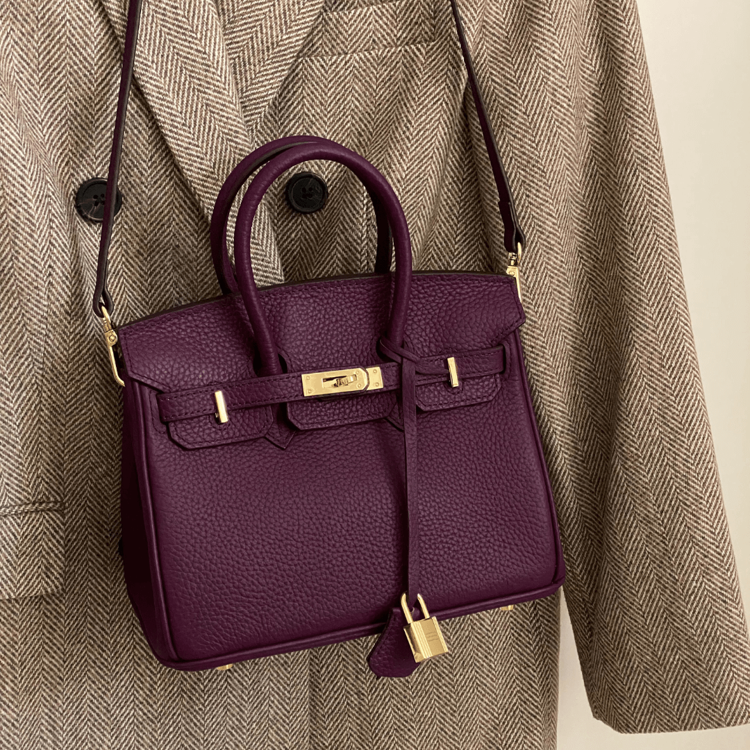 Detail shot highlighting quality craftsmanship and leather texture of handbag
