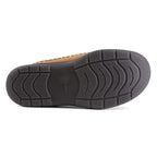 Flexible rubber sole of men's orthopaedic slippers demonstrating grip pattern