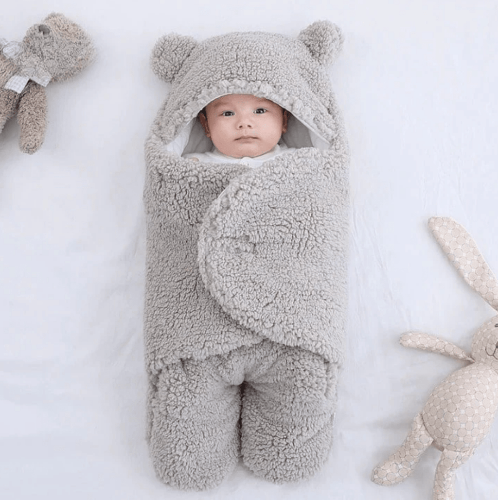 BONEROSHOP sleeping bag in car seat, demonstrating compatibility with infant carriers and travel systems.
