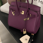 Luxury leather handbag worn in lifestyle setting showing elegant design