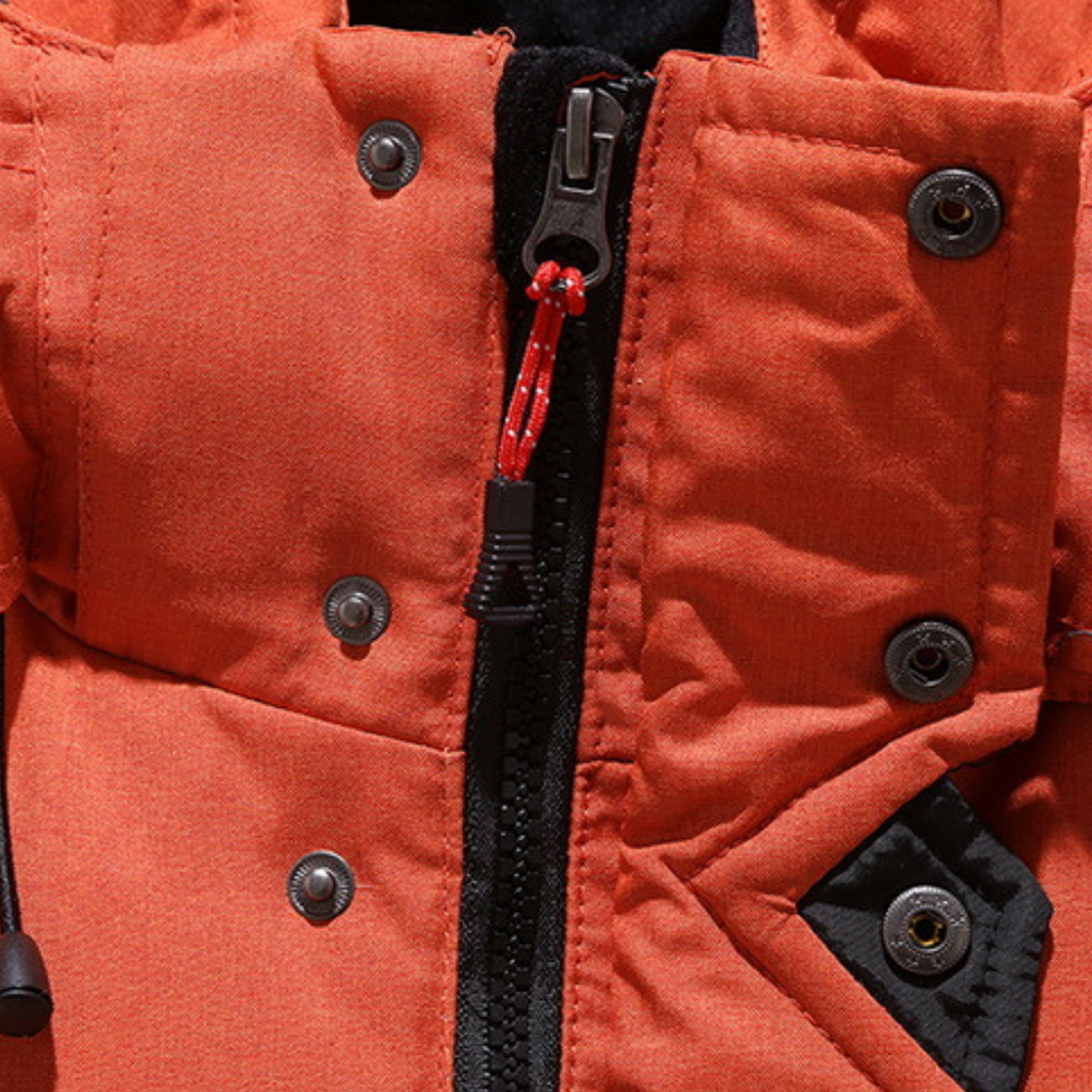 Nordfall Winter Parka fabric close-up showing premium cotton outer material.