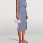 Longchamp Élan Mini Bag lifestyle shot showing compact yet spacious design