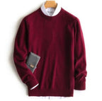 Lifestyle shot of man wearing premium cashmere jumper in elegant setting