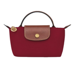 Longchamp Élan Mini Bag packaging and contents with free strap