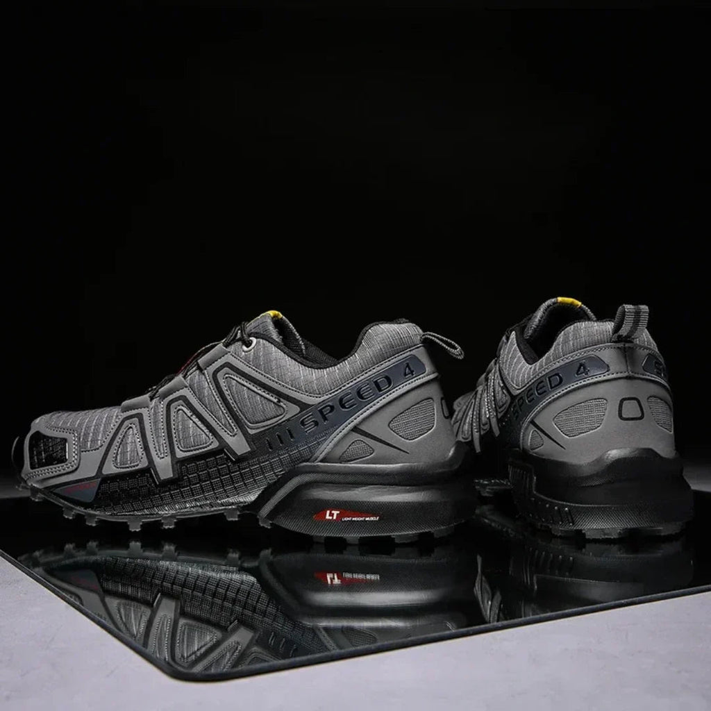 SpeedCross IV trainers on muddy trail terrain demonstrating exceptional grip performance.