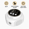 Ultrasonic spider repeller plugged into wall socket in modern home interior.