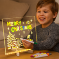 GlowCraft LED drawing tablet for children illuminated with colourful artwork on transparent surface