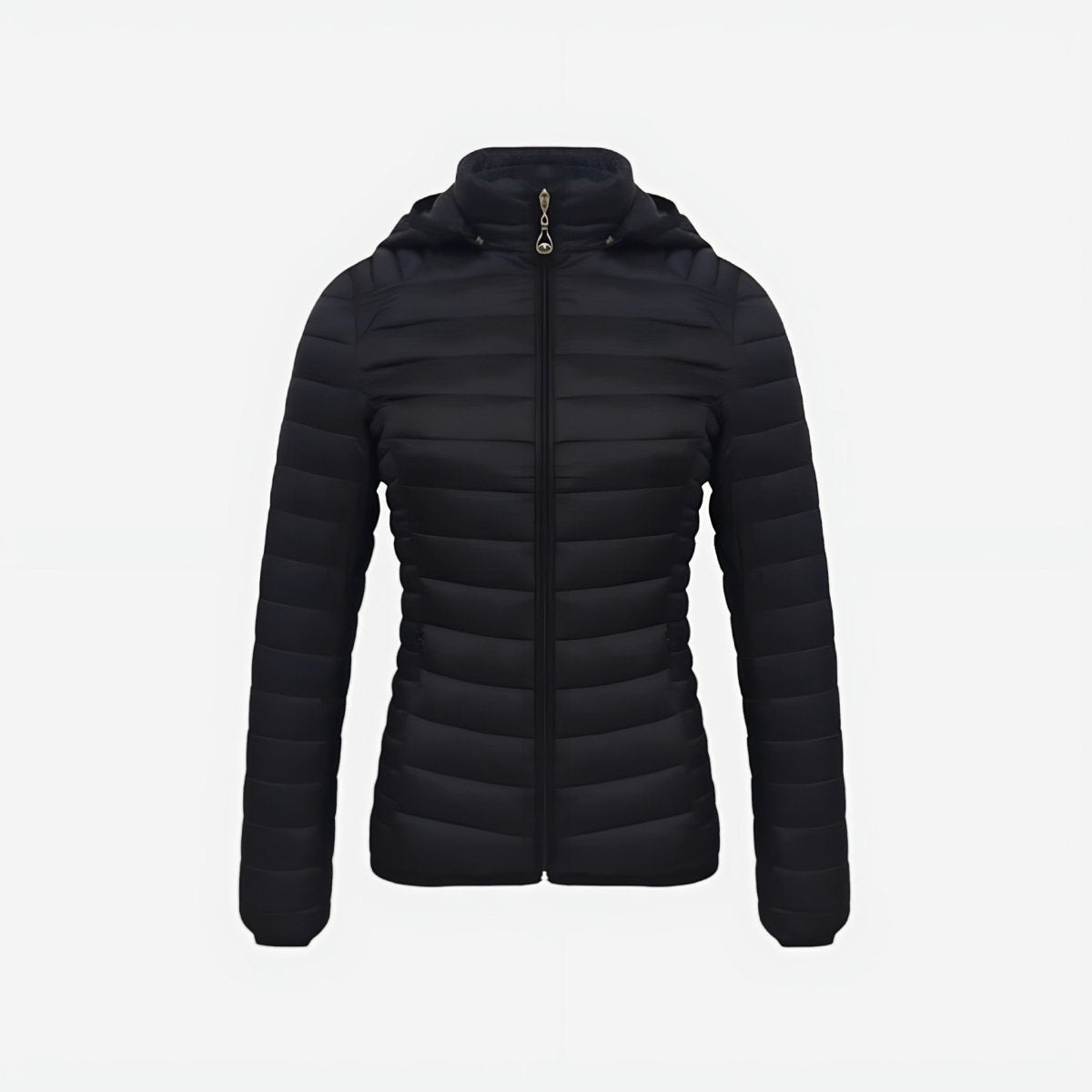 Woman wearing lightweight puffer jacket in natural outdoor setting