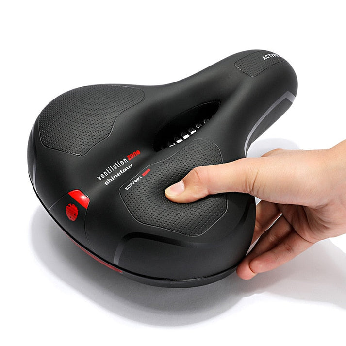 CLOUDCOMFORT PRO bicycle saddle shown in detail, highlighting ergonomic design for pain-free cycling.