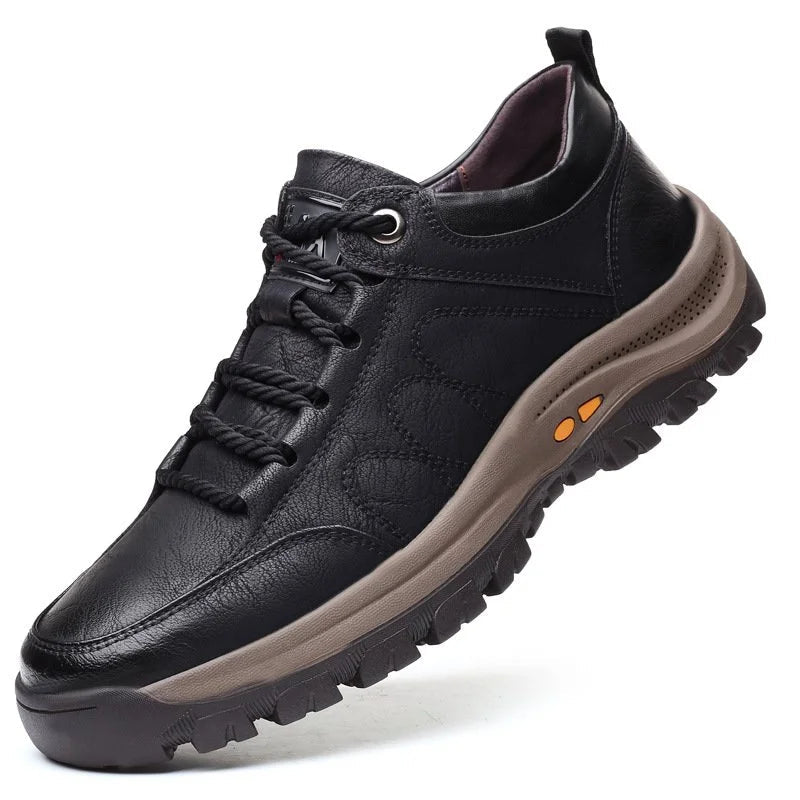 Men's orthopaedic leather boots in black and brown colourways, displaying premium cowhide construction.