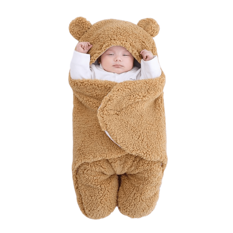 Baby wrapped comfortably in BONEROSHOP sleeping bag, demonstrating the secure fit and adorable teddy bear ear design.