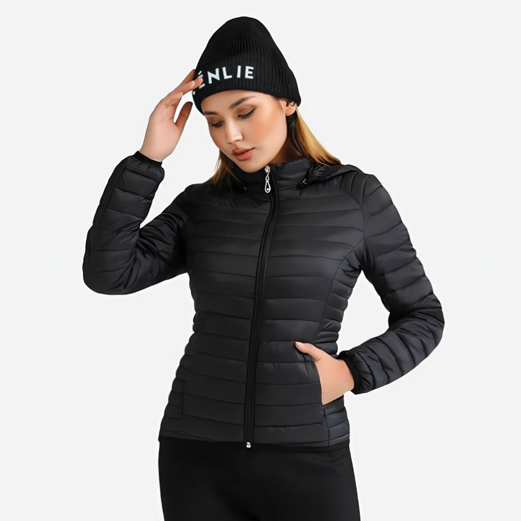 Close-up detail of lightweight puffer jacket showing water-repellent fabric and zipped pocket