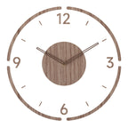 Close-up view of wooden wall clock showing natural grain and minimalist design