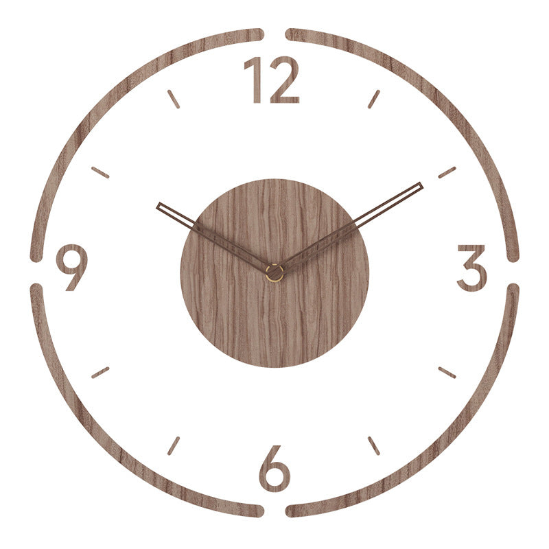 Close-up view of wooden wall clock showing natural grain and minimalist design