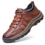 Detailed close-up of men's orthopaedic boot upper revealing soft leather texture and breathable design.