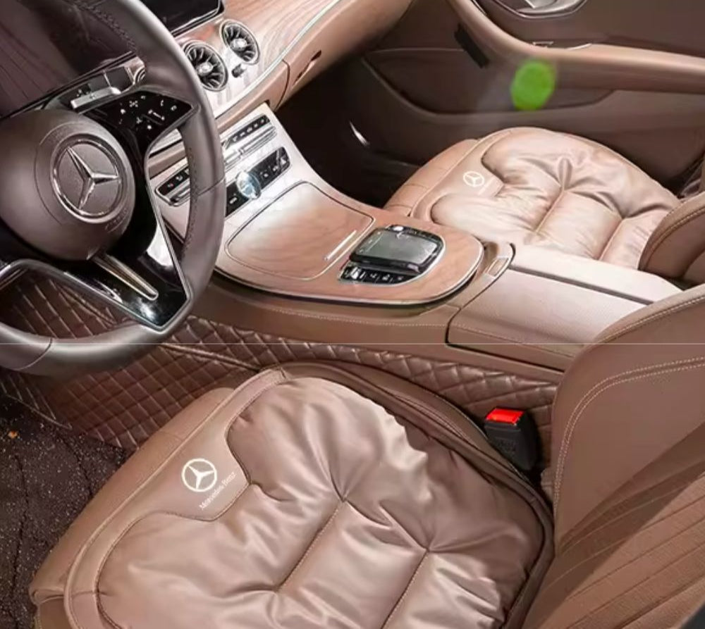Close-up of the Velario car cushion showing breathable fabric and ergonomic contoured design.