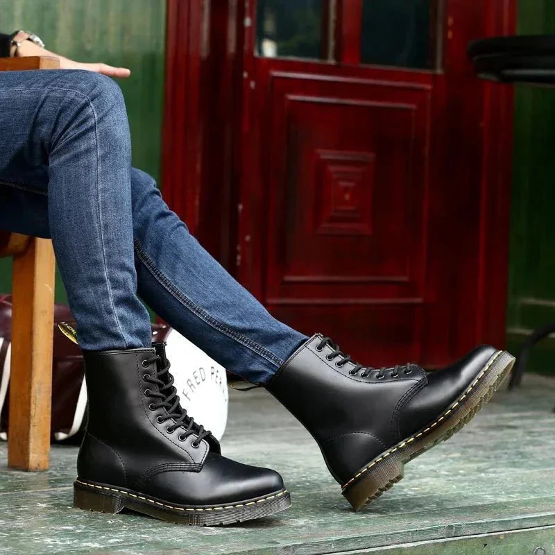 Close-up detail of Martin boots showing impeccable artisanal craftsmanship and sophisticated finishing