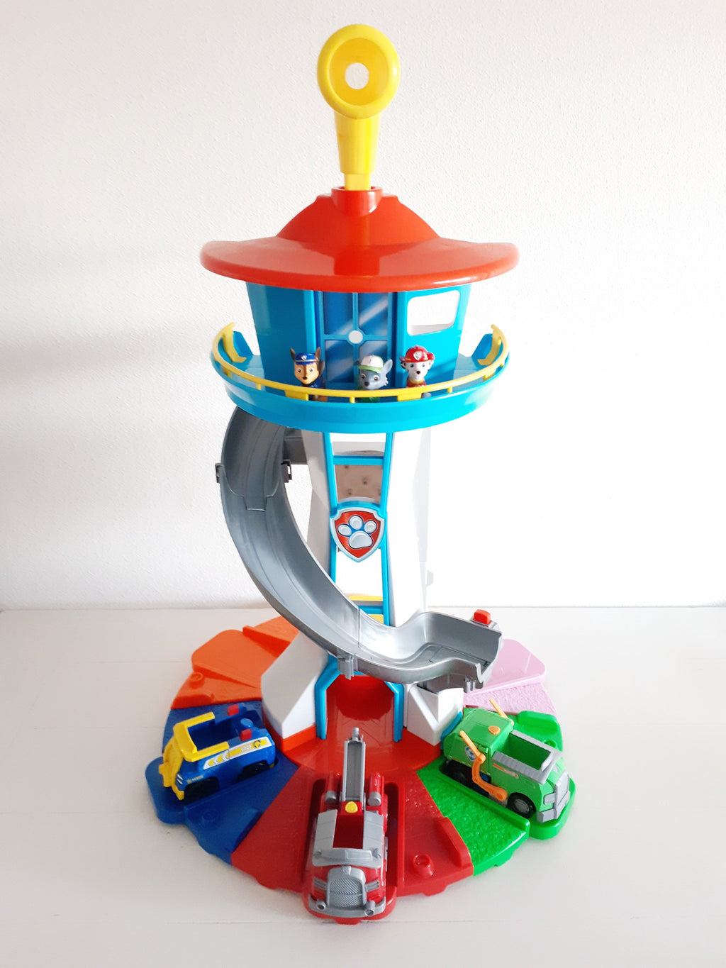Close-up view of PawPatrol toy cars showing vibrant colours and detailed design