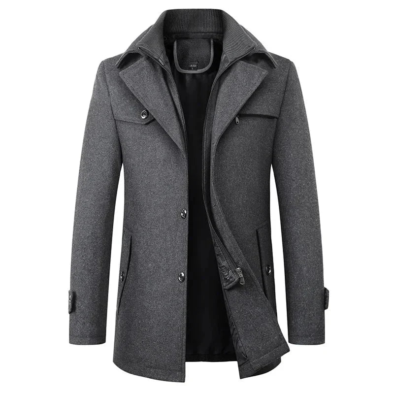 Close-up detail of Andrew coat showing waterproof fabric, functional pockets and adjustable cuffs