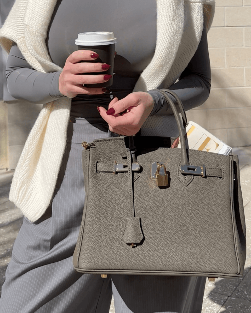 Close-up view of premium genuine leather finish on luxury handbag