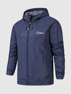 Close-up detail of Titleist waterproof jacket premium polyester construction and finish