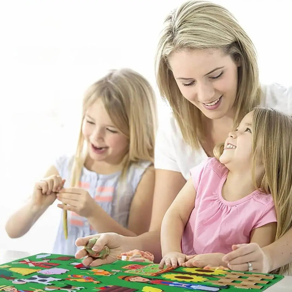 Child playing with repositionable felt pieces on the Montessori farm board