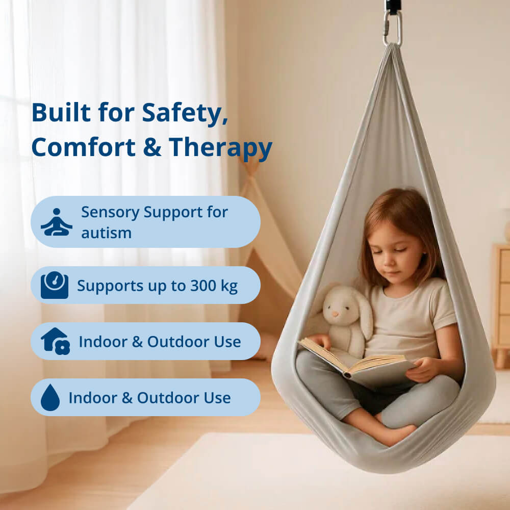 Black therapeutic swing for children, supporting balance and emotional regulation.