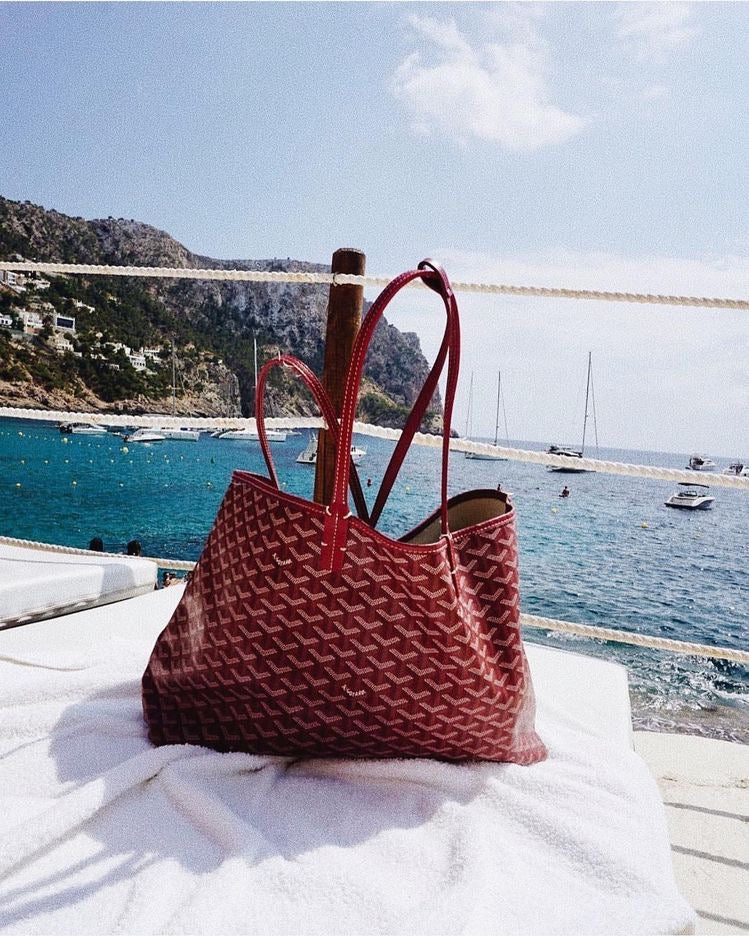 High-quality women's handbag in orange showing durable construction and elegant finish