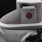 Person wearing USB heated slippers at home demonstrating comfort and warmth
