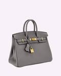 Luxury leather handbag demonstrating versatile carrying options and design details
