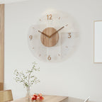 Detail of silent quartz movement and wooden construction of wall clock