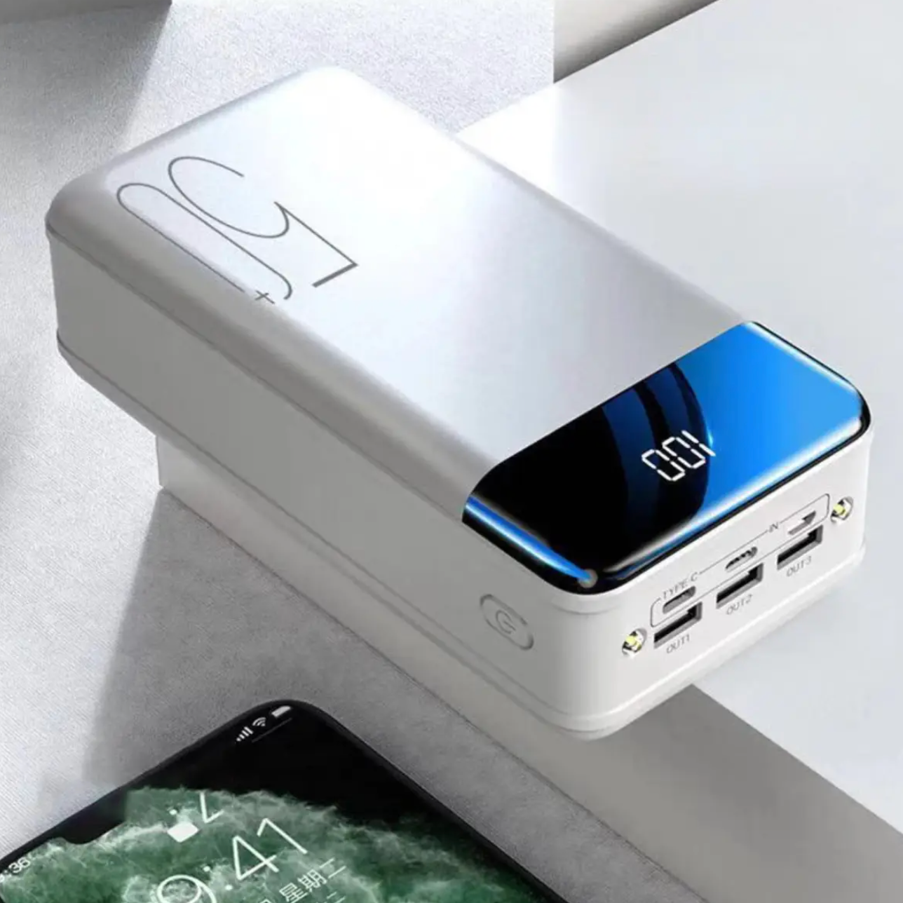 Portable TitanCharge 50,000mAh power bank being carried in a rucksack demonstrating compact design