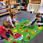Full view of the 105×75cm Montessori felt board with all farm pieces arranged
