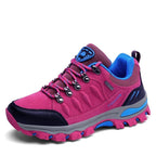 Women's hiking shoes in pink colour showing breathable material construction