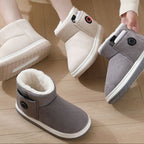 USB heated slippers connected to power bank showing portable heating functionality