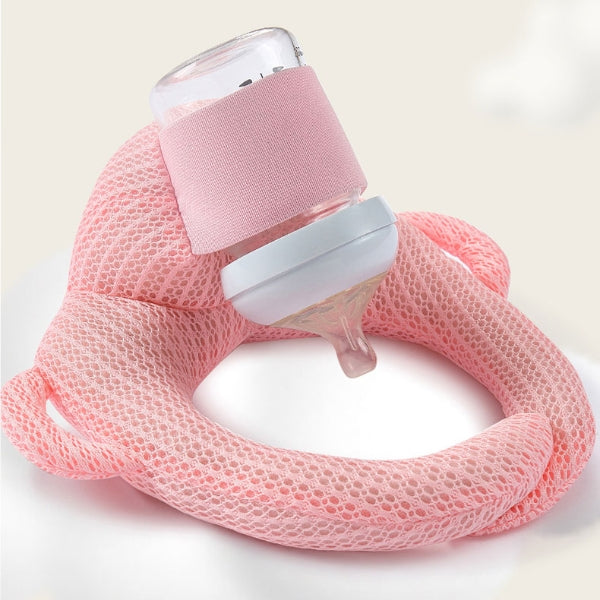 Baby bottle holder cushion in pink with wraparound head and body support