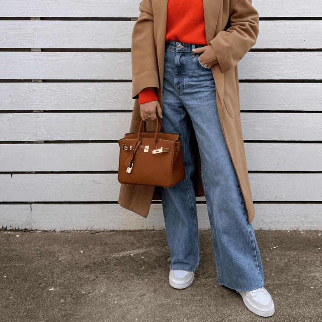 Seven available colours of luxury leather handbag displayed together
