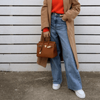 Seven available colours of luxury leather handbag displayed together