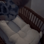 Portable BONEROSHOP Baby Sleep Cushion being carried, demonstrating its lightweight travel-friendly design.