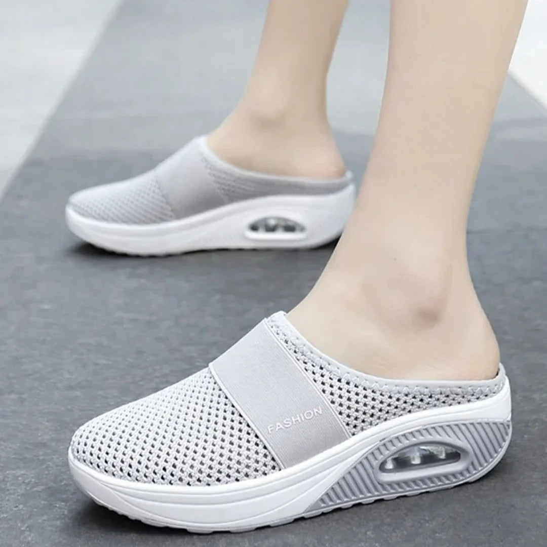 Person wearing OrthoAir shoes demonstrating comfort during everyday activities