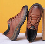 Detail shot of men's orthopaedic boots emphasising anti-slip rubber sole and robust construction.