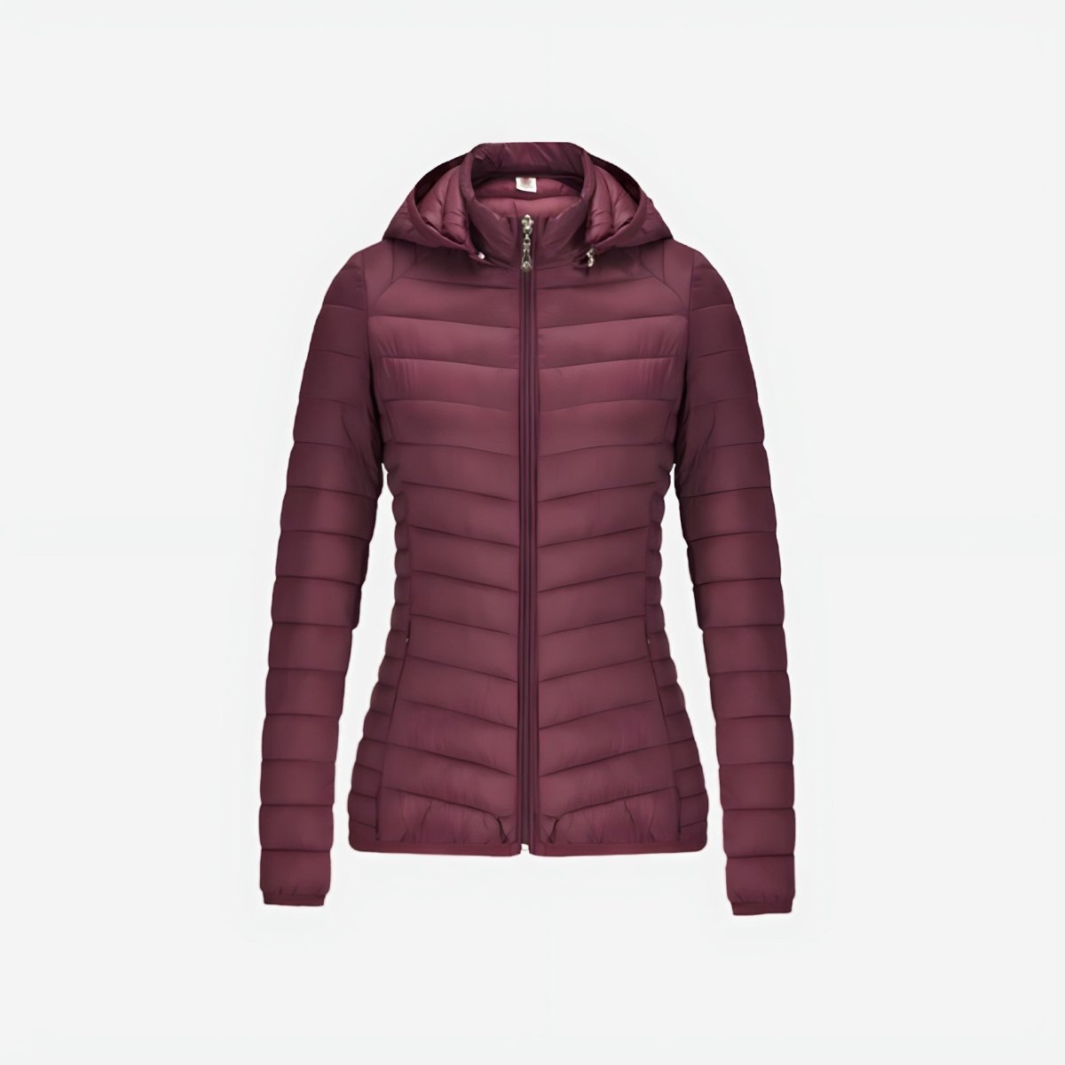 Woman wearing lightweight puffer jacket during outdoor mountain activity