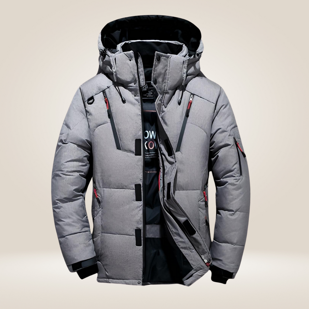 Nordfall Winter Parka pocket detail showing secure zip closures and practical design.