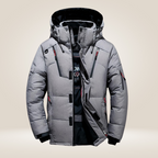 Nordfall Winter Parka pocket detail showing secure zip closures and practical design.