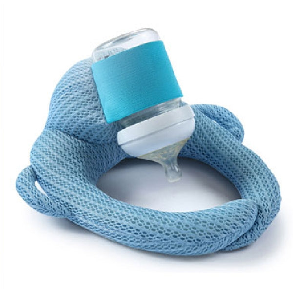 Hands-free feeding pillow in grey velvet holding bottle at ideal angle