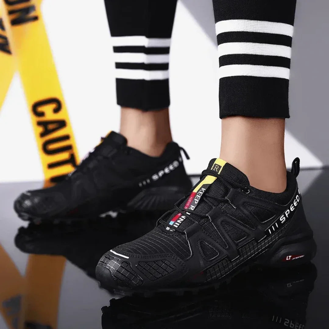 SpeedCross IV trainers close-up of breathable mesh upper with protective overlay reinforcements.